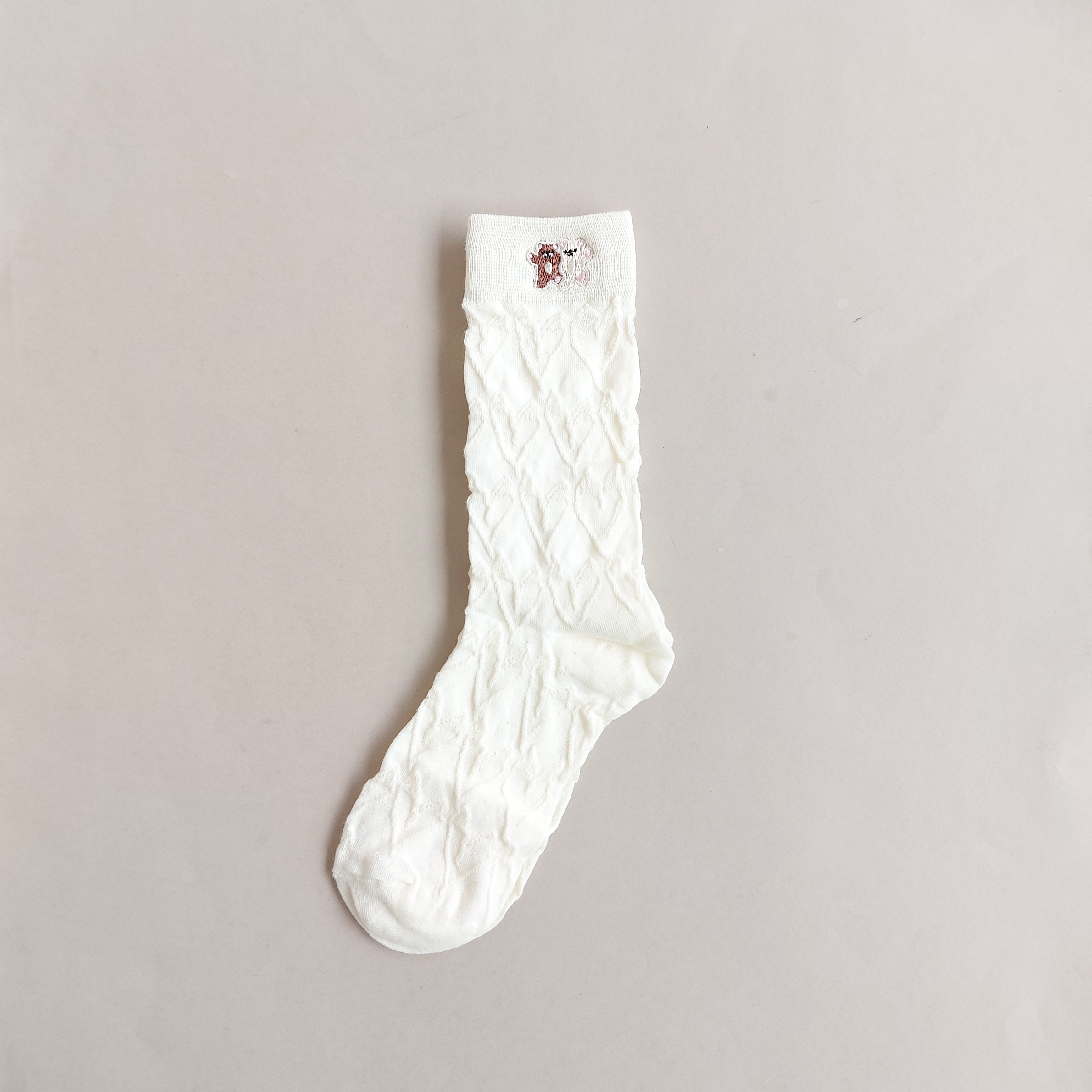 جوراب ساقدار زنانه طرحدار برجسته گلدوزی شده happy july