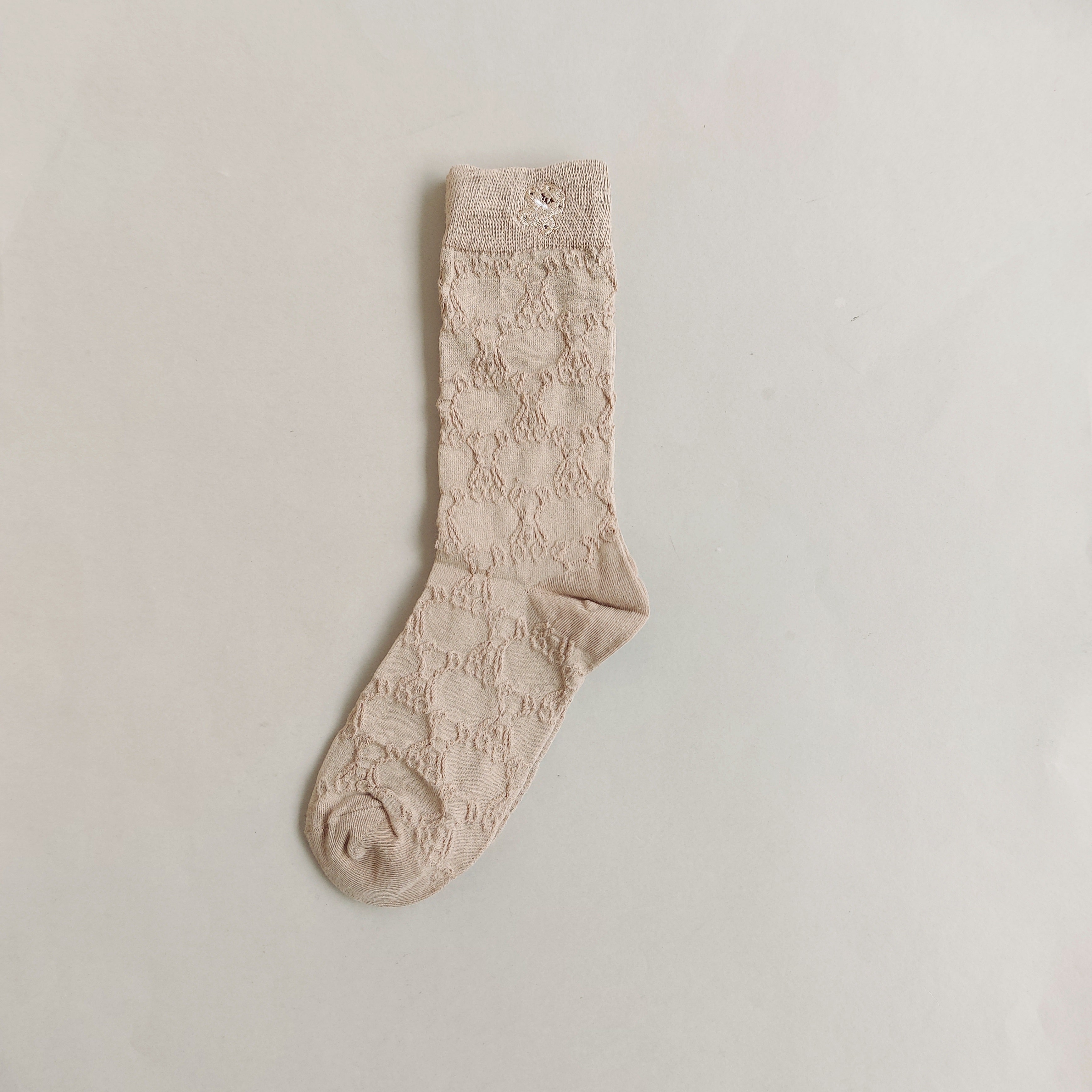 جوراب ساقدار زنانه طرحدار برجسته گلدوزی شده happy july