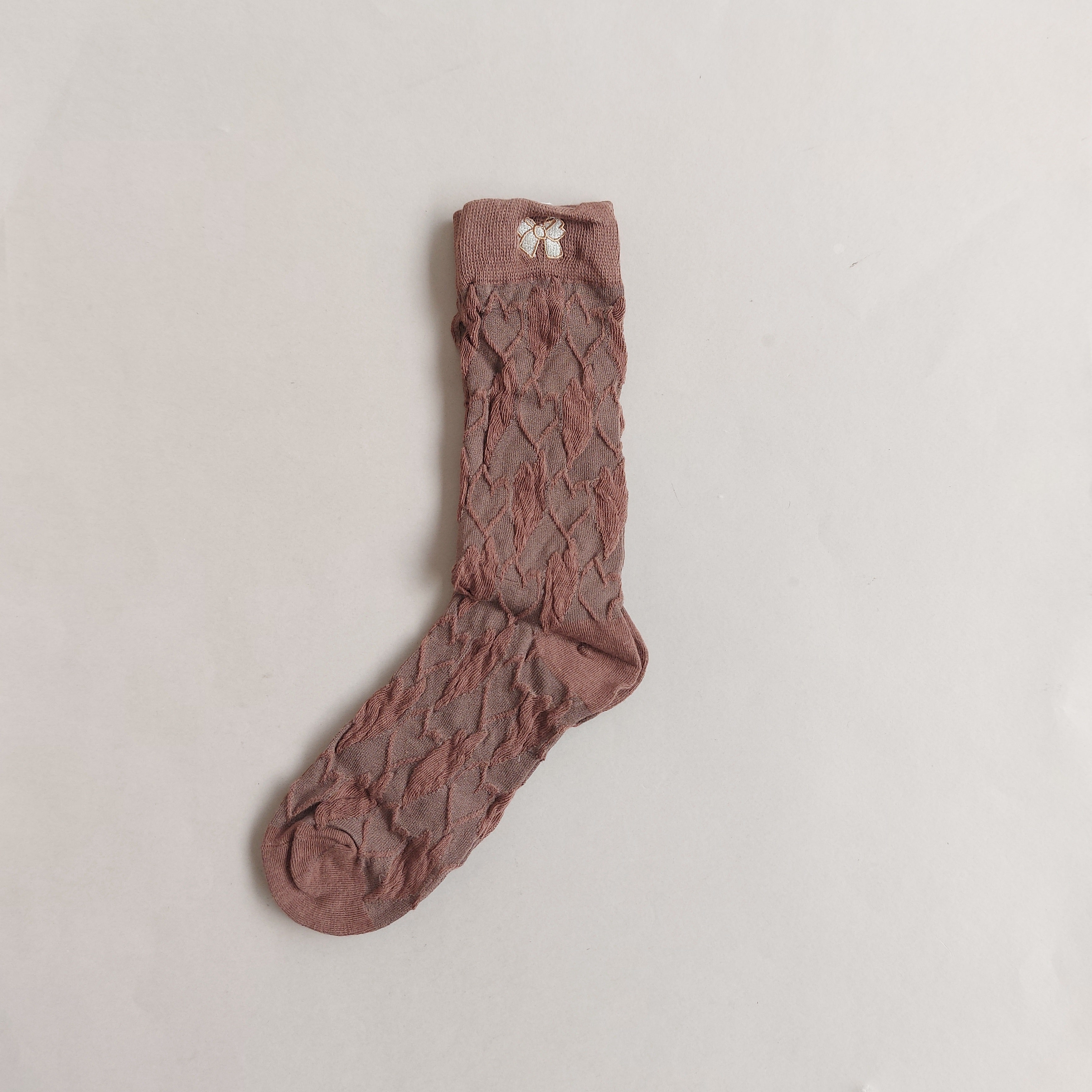 جوراب ساقدار زنانه طرحدار برجسته گلدوزی شده happy july